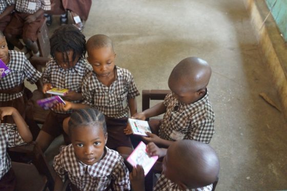 Students At St. Jude's Playing With Their New Crayons During Lagoshats Donation